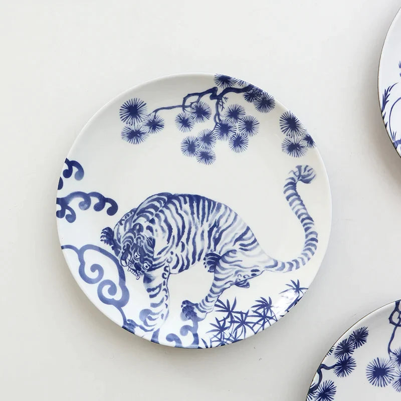 Afralia™ Blue and White Ceramic Animal Dinner Plates - Set of 4