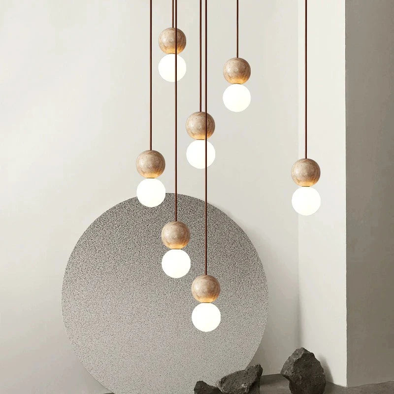 Afralia™ Stone Cream Pendant Light: Retro Round Ball Chandelier for Bedroom, Bar Table, or Bedside