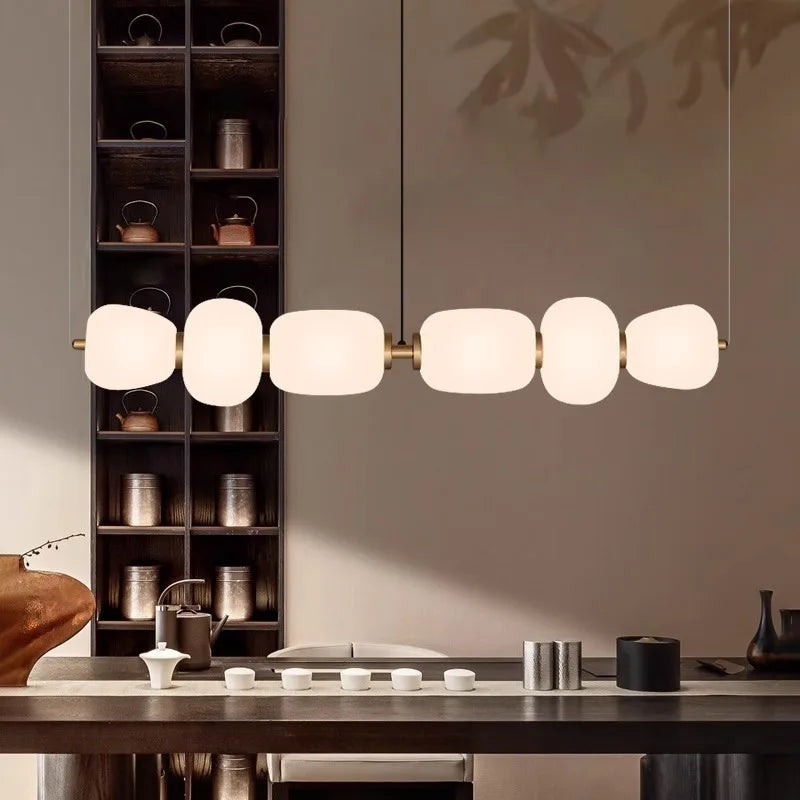 Afralia™ Milky White Glass Pendant Lamp: Modern Nordic LED Hanging Light for Dining, Living Room, Kitchen.