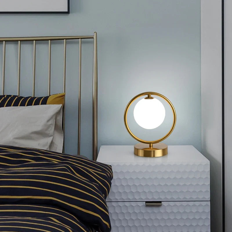 Afralia™ LED Brass Glass Table Lamp for Bedside Reading Desk - Modern Round Ring Design