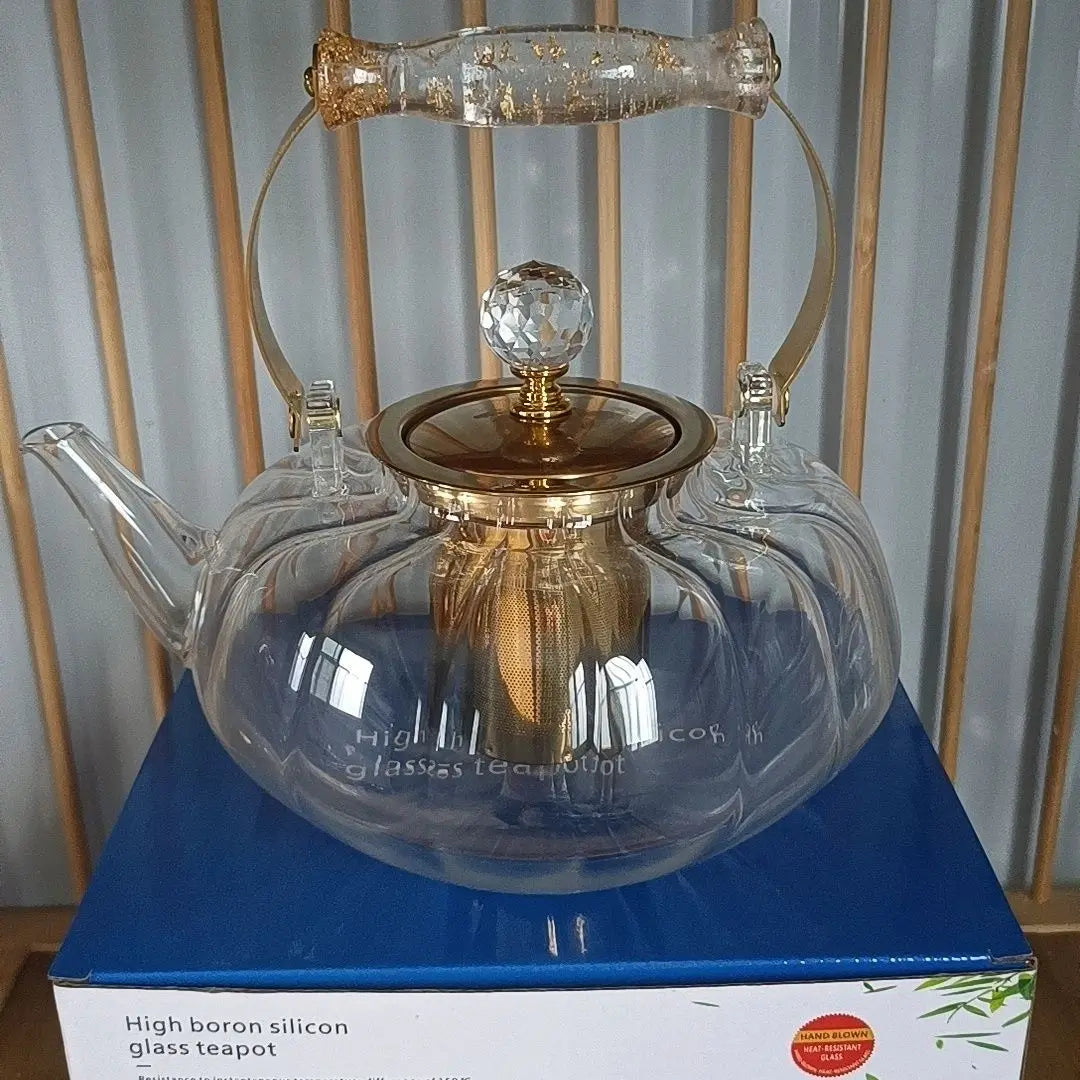 Afralia™ Amber Glass Teapot Filter, Heat-Resistant, Pumpkin-Shaped, Ideal for Boiling and Brewing Tea