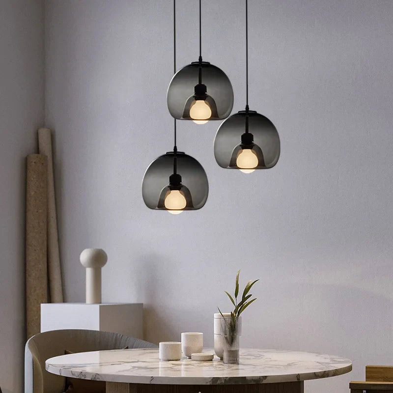 Afralia™ Modern Minimalist Glass Pendant Lamp for Restaurants - Round Ball Hanging Light