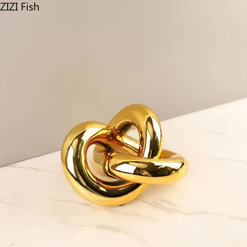 Afralia™ Gold-plated Knot Ornaments: Modern Geometric Resin Desk Decor & Room Craft