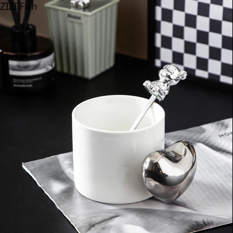 Afralia™ Silver Heart Handle Mug - Ceramic Coffee Cup for Dining Table or Afternoon Tea