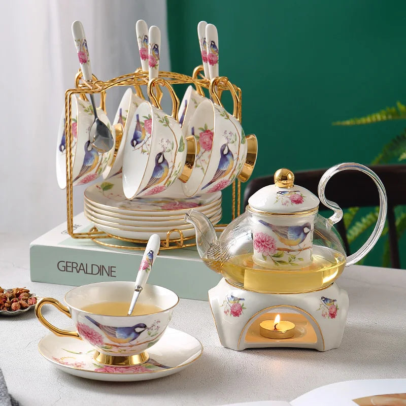 Afralia™ Floral Glass Teapot Set with Bone China Tea Cups and Strainer