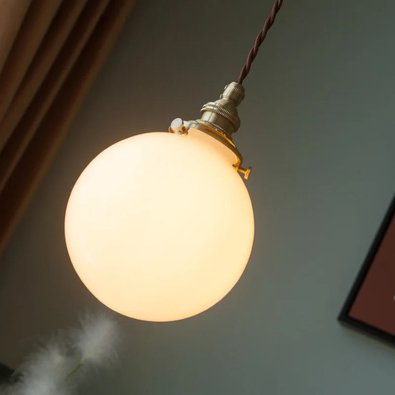 Afralia™ Cream Glass Ball LED Pendant Light for Kitchen Living Room Nordic Vintage Copper