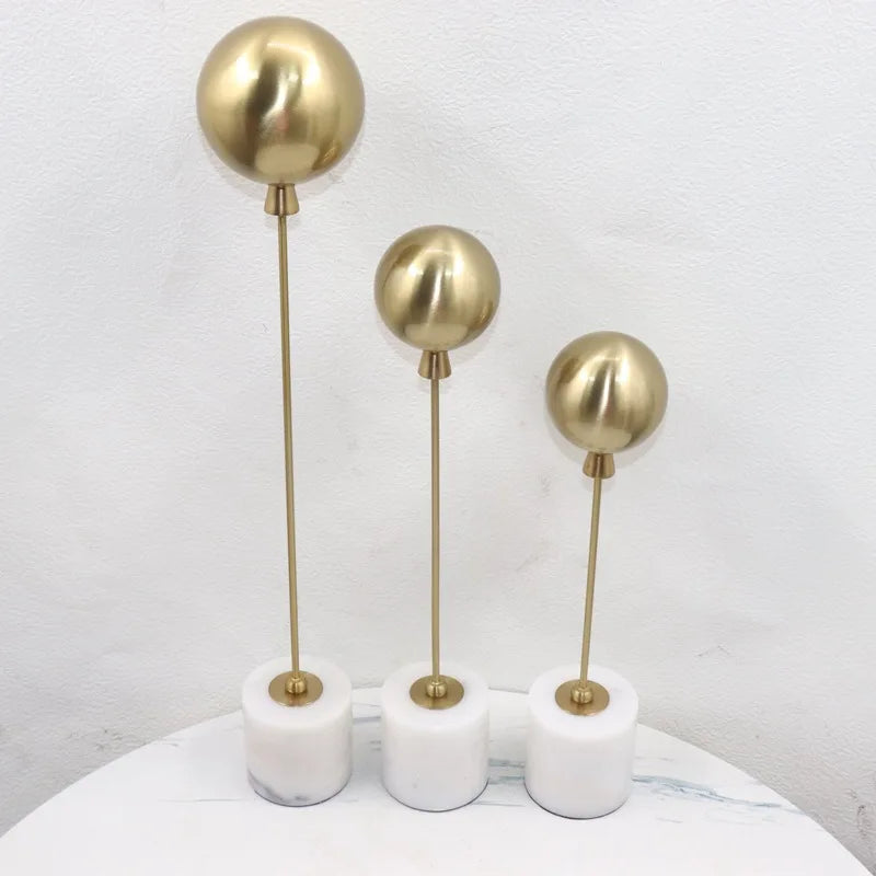 Afralia™ Golden Geometric Balloon Metal Ball Sculpture & Decorative Figurine