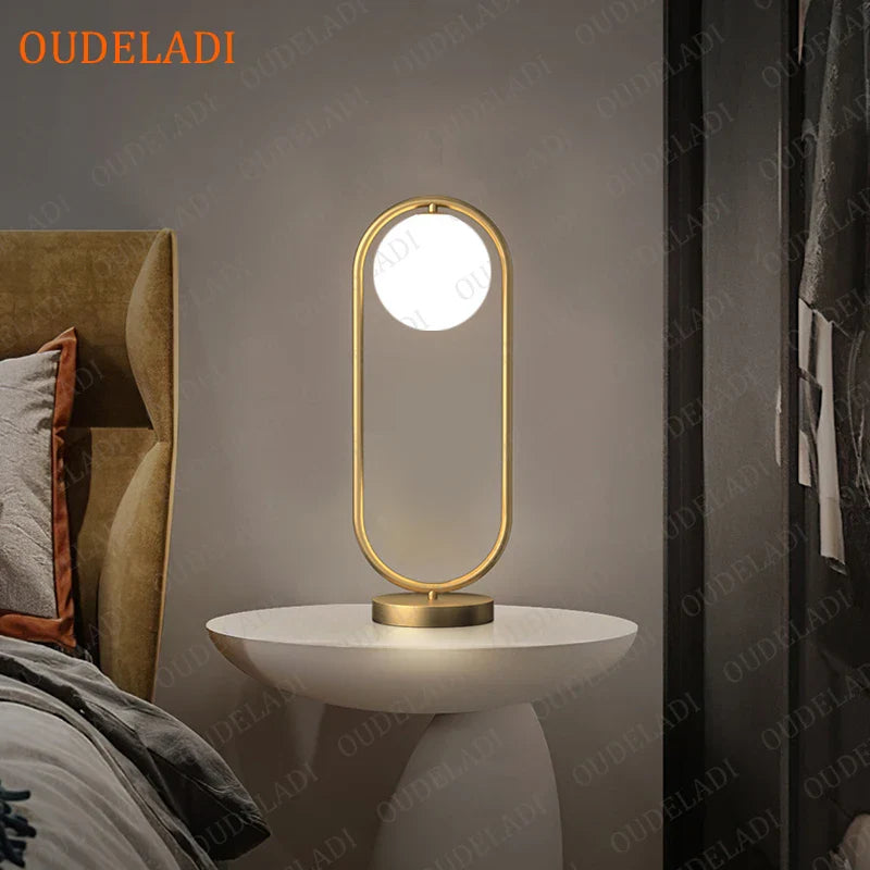 Afralia™ Nordic Golden Body Desk Lamp with Frosted Glass Shade