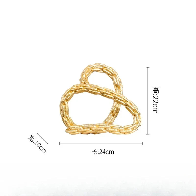 Afralia™ Golden Knot Chain Ring Geometric Decorative Figurine - Resin Home Decor Accessory