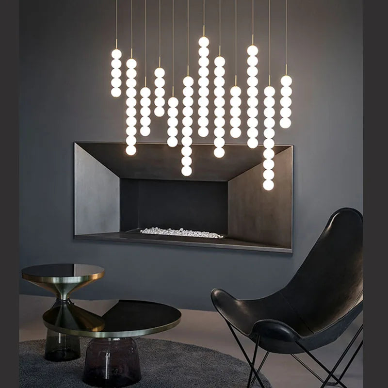 Afralia™ Art Deco LED Glass Pingpong Pendant Light in Gold Chrome Black.