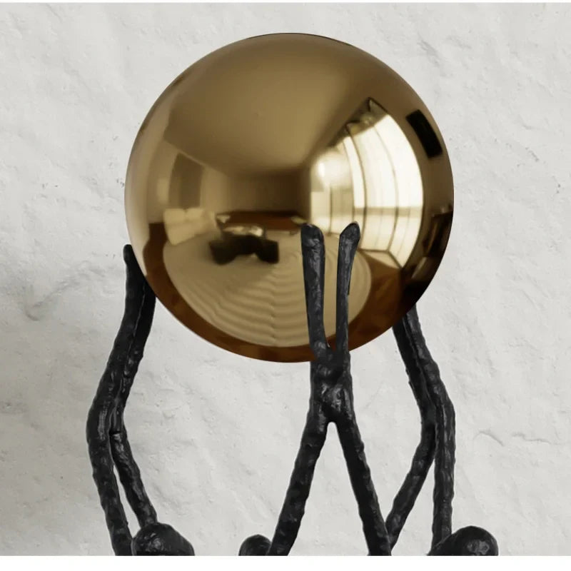 Afralia™ Human Figure Sculpture Golden Ball Holder Metal Figurine Home Decor