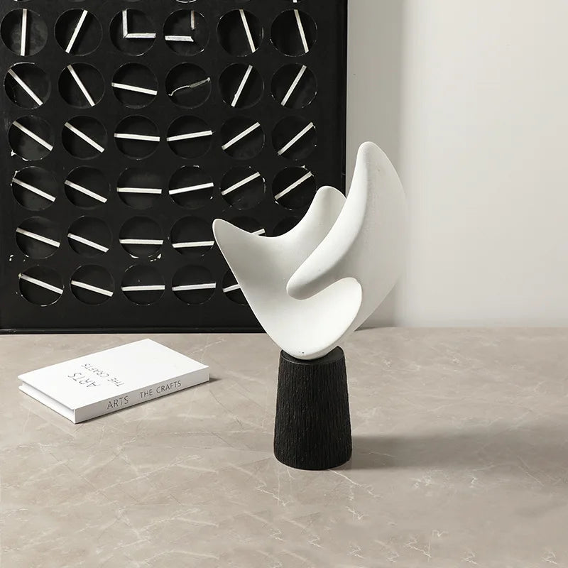 Afralia™ Abstract Hollowed-out Resin Sculpture, Black and White Modern Home Decor Statue.