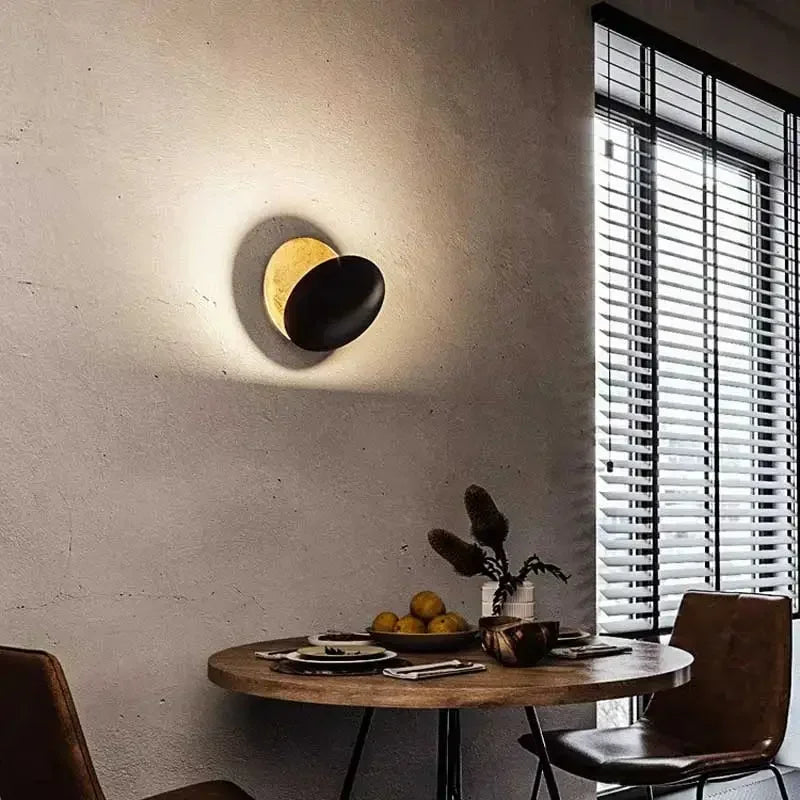 Afralia™ Rotatable Solar Eclipse LED Wall Lights in Black Gold Texture
