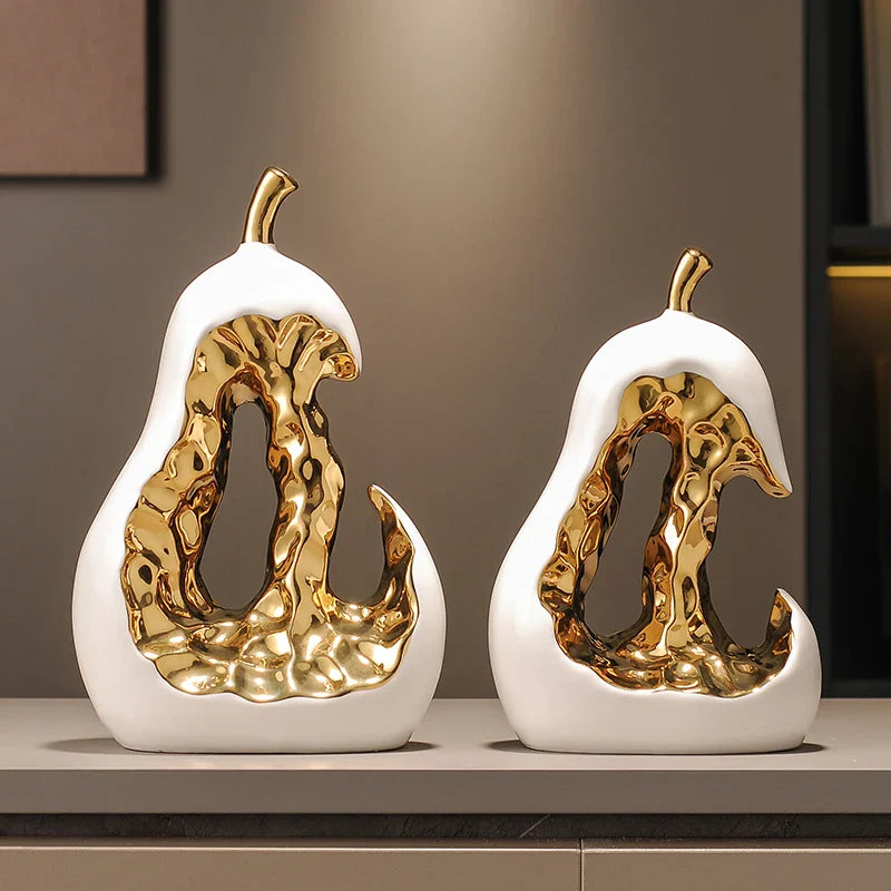 Afralia™ Ceramic Golden Pear Sculpture - Abstract Hollow Fruit Decor for Home Accessories