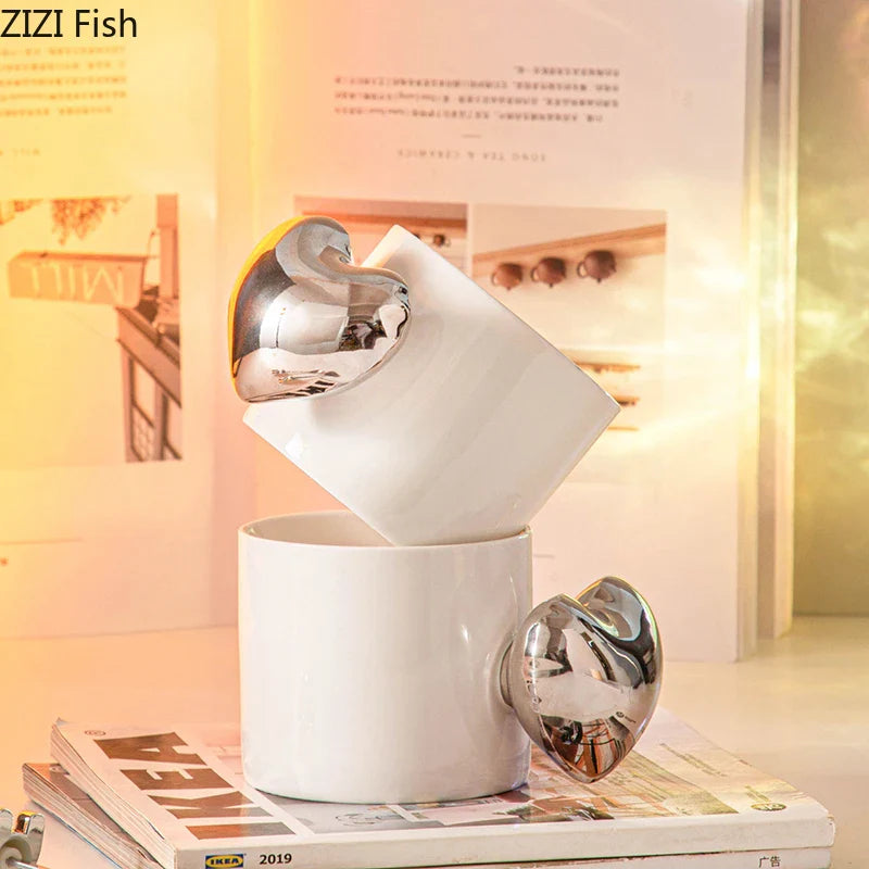 Afralia™ Silver Heart Handle Mug - Ceramic Coffee Cup for Dining Table or Afternoon Tea