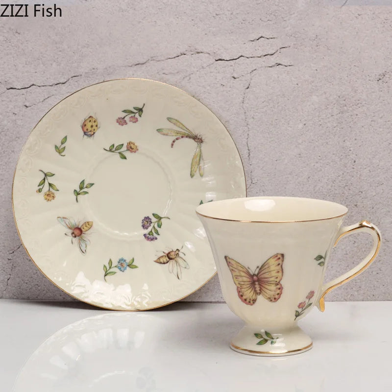 Afralia™ Butterfly Gold Ceramic Cup & Saucer Set