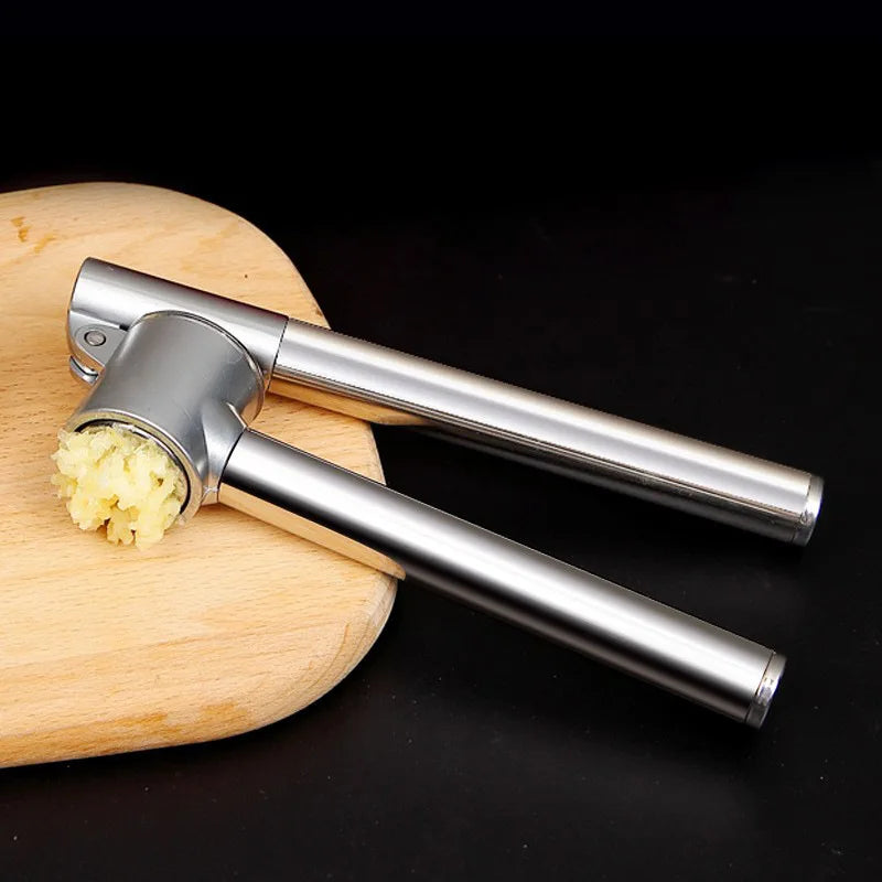 Afralia™ Stainless Steel Garlic Press Spoon Vegetables Chopper & Crusher