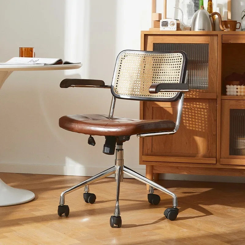Afralia™ Rattan Ergonomic Swivel Office Chair with Armrests and Rollers
