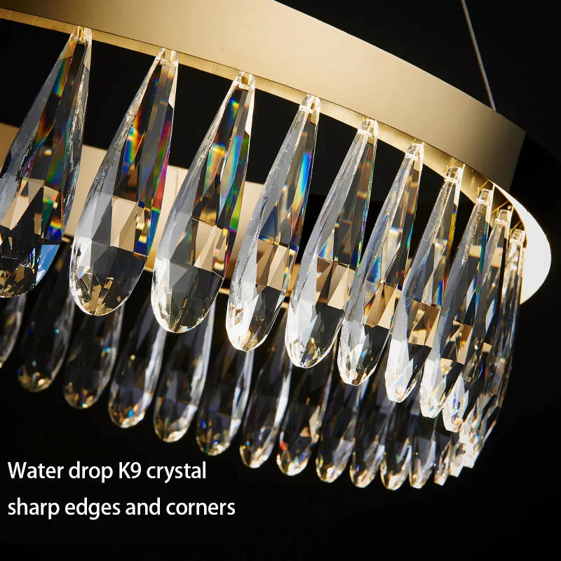 Afralia™ Water Drop Crystal Chandelier: Modern Golden Round Pendant Light for Stylish Ceiling Decor