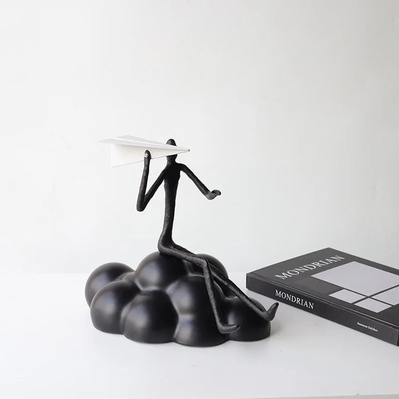 "Afralia™ Resin Paper Airplane Cloud Figure for Home Decor - Black Cartoon Abstract Figurine"
