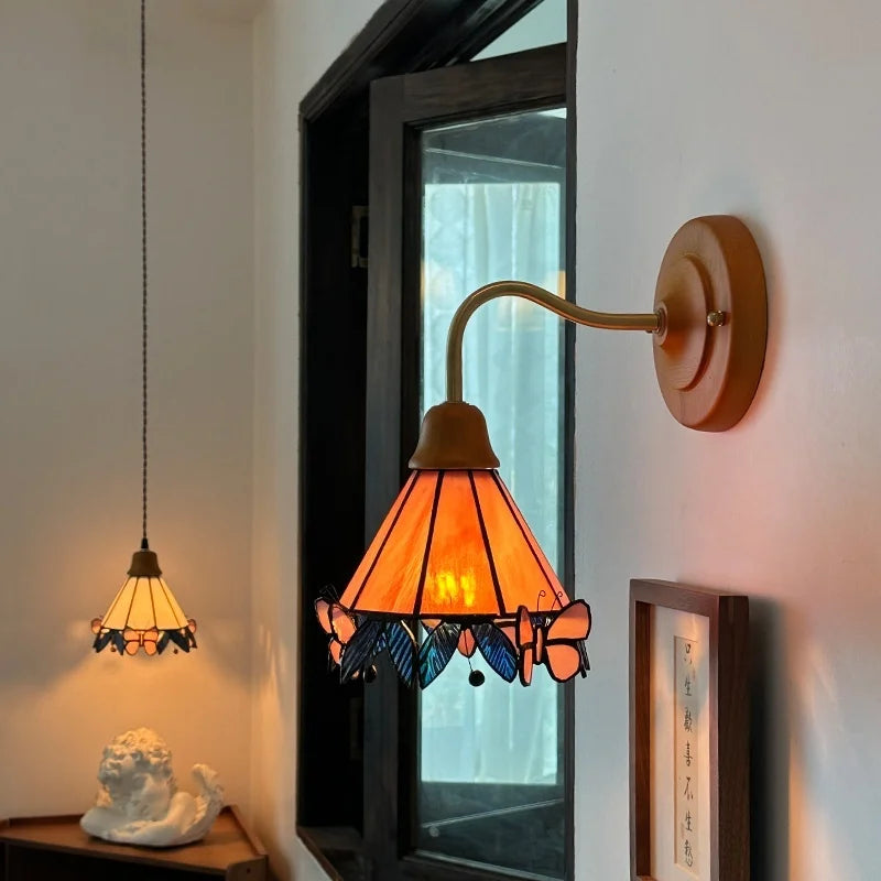 Afralia™ Butterfly Glass LED Wall Light with Copper Arm for Home Decor.