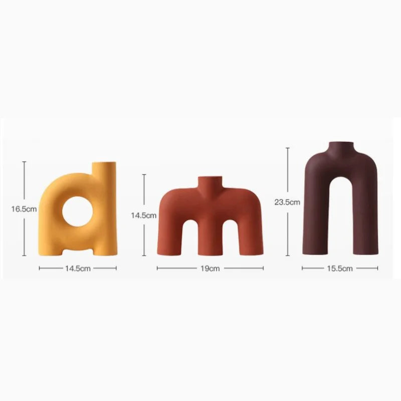 Afralia™ Geometric Ceramic Vase: Hollowed-out Letters Flower Arrangement Home Decor