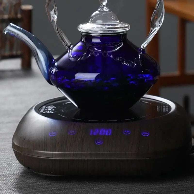 Afralia™ Blue Glass Teapot - Japanese Style Heat-Resistant Twisted Handle Glass Teapot