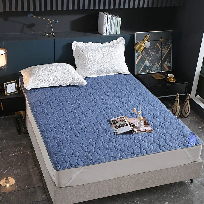 Afralia™ Quilted Waterproof Bed Pad Protector: Non-slip, Skin-friendly for Elderly & Children