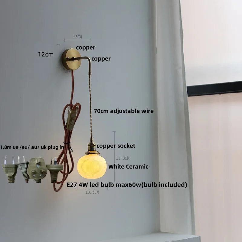Afralia™ Adjustable LED Wall Light Clear Glass Copper Bedside Lamp