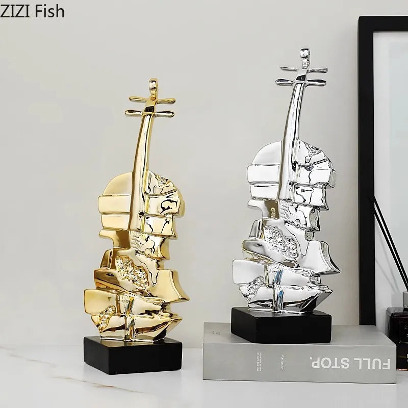 Afralia™ Golden Violin Sculpture Resin Art Ornament Stack Violin Statue Decor
