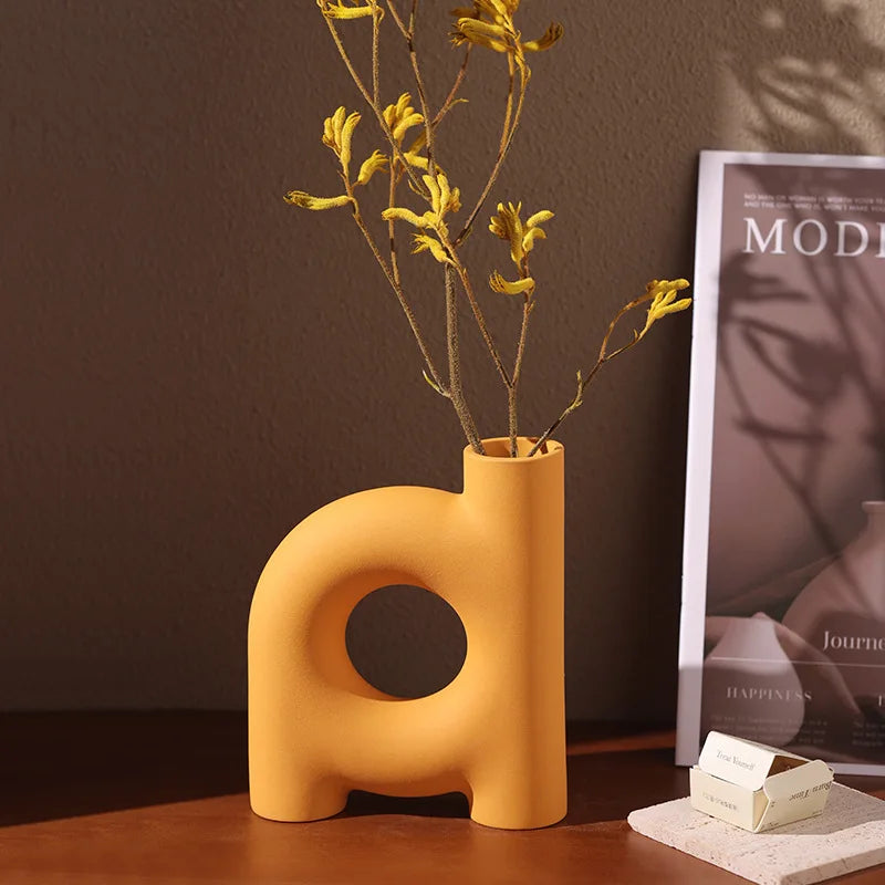 Afralia™ Geometric Ceramic Vase: Hollowed-out Letters Flower Arrangement Home Decor