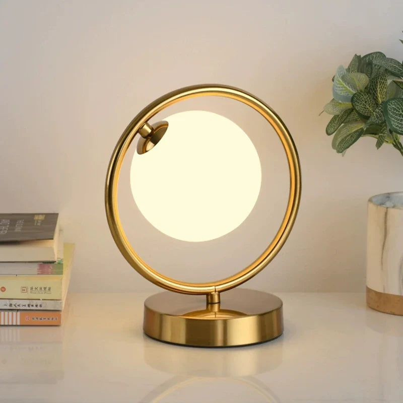 Afralia™ LED Brass Glass Table Lamp for Bedside Reading Desk - Modern Round Ring Design