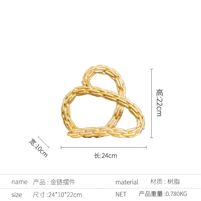 Afralia™ Golden Knot Chain Ring Geometric Decorative Figurine - Resin Home Decor Accessory