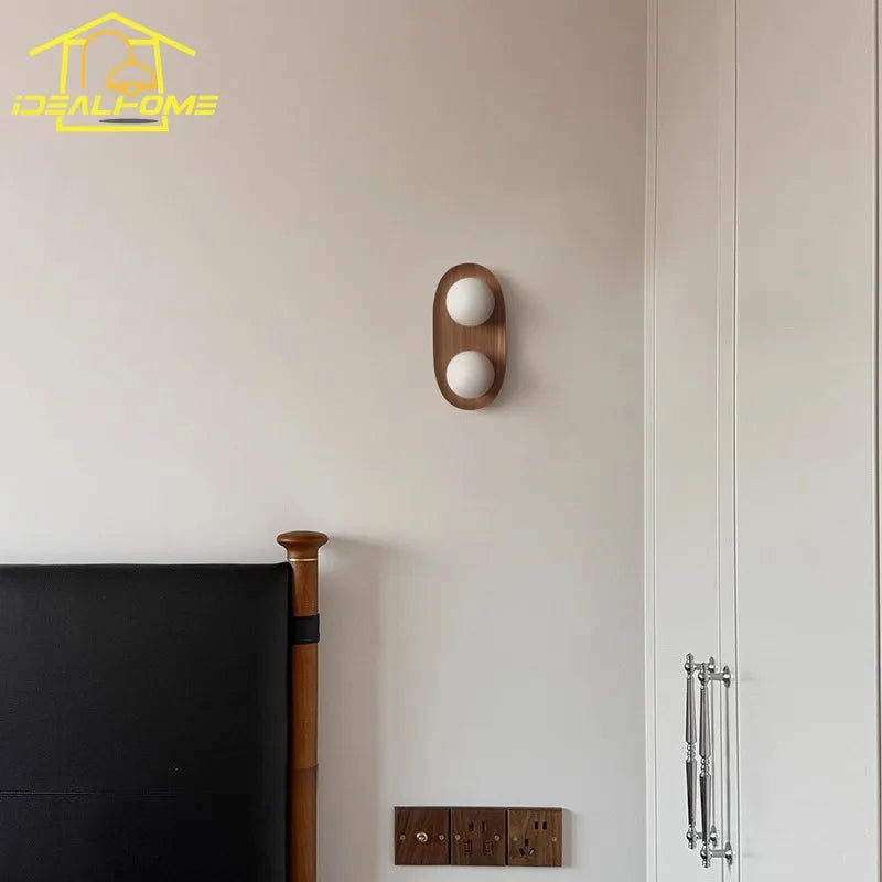 Afralia™ Round Glass LED Wall Lamp Double Head Solid Wood Minimalist Designer