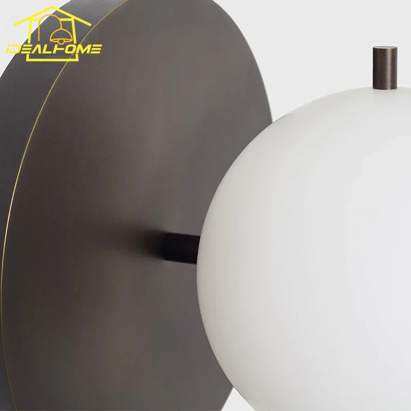 Afralia™ Black/Gold Ball Wall Lamp - Minimalist Iron Art Decor for Bedroom & Cafe