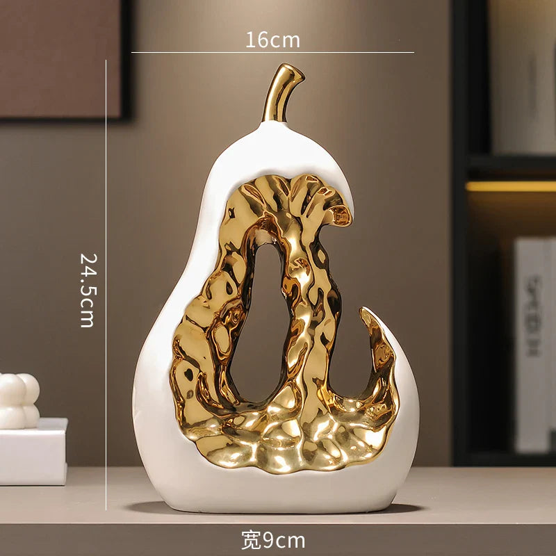 Afralia™ Ceramic Golden Pear Sculpture - Abstract Hollow Fruit Decor for Home Accessories
