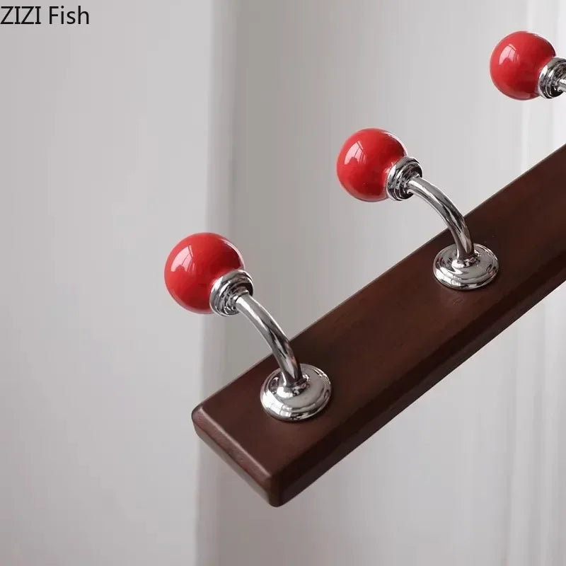 Afralia™ Walnut Wood Hat Hook Wall Storage with Decorative Shelves