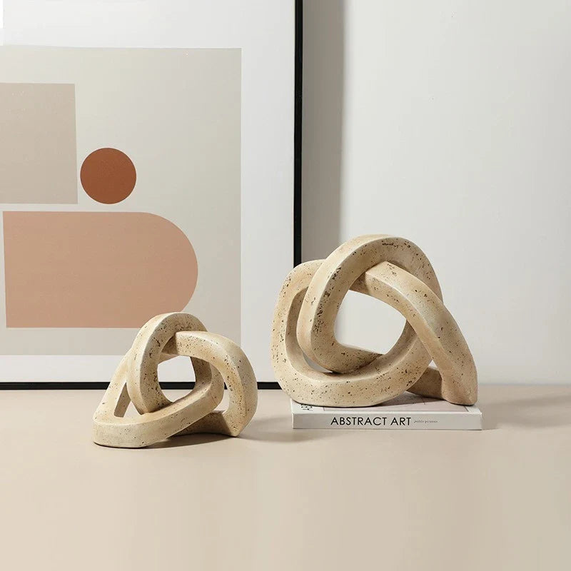 Afralia™ Geometric Interlocking Loop Knot Resin Art Ring Figurine