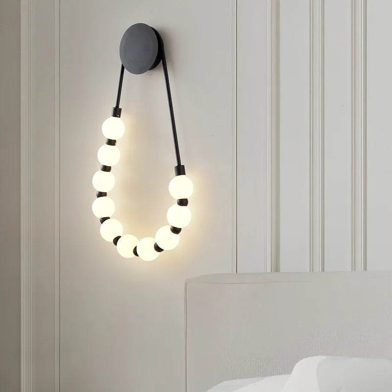 Afralia™ LED Necklace Wall Lights: Gold Black Metal White Acrylic Sconce for Home Art Deco