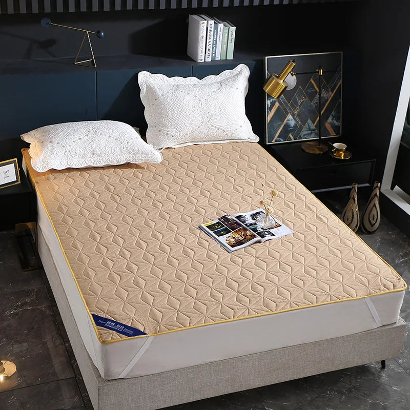Afralia™ Quilted Waterproof Bed Pad Protector: Non-slip, Skin-friendly for Elderly & Children