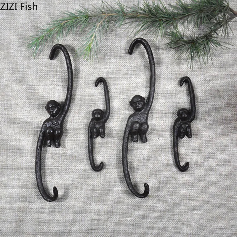 Afralia™ Monkey S Shape Hook Shelf: Cast Iron Decorative Coat Rack for Pastoral Outdoor Decor
