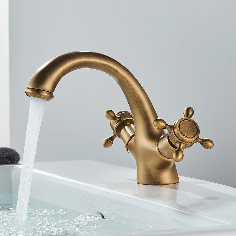 Afralia™ Antique Brass Dual Handle Basin Faucet Deck Mounted Bathroom Mixer Tap