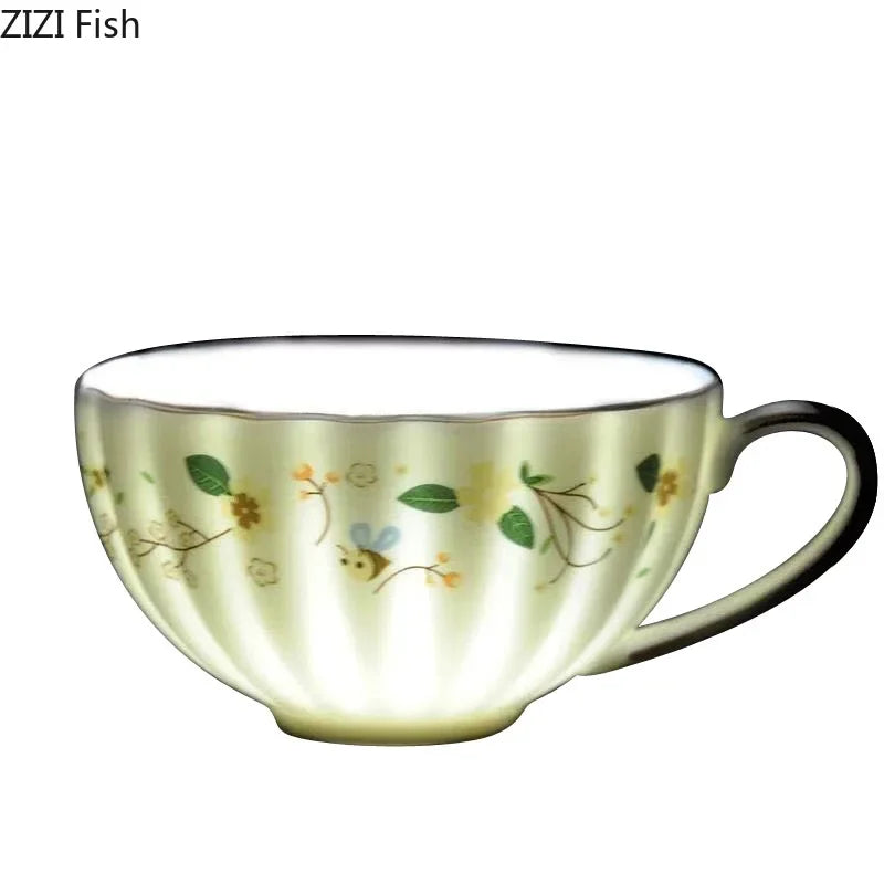 Afralia™ Elegant Gold Flower Cup & Saucer Set - Delicate Porcelain Tea Coffee Mug