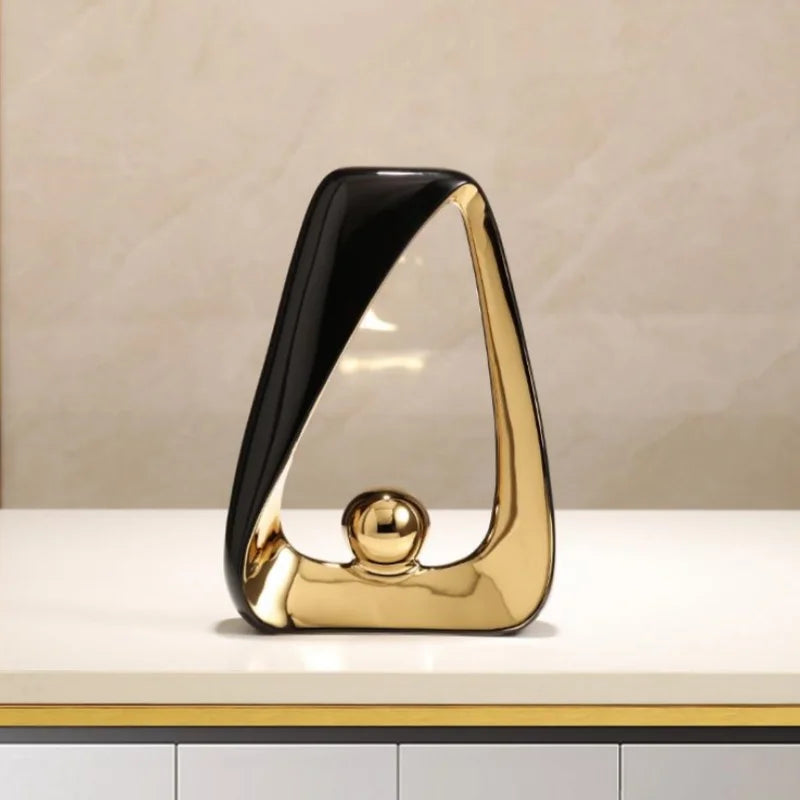 Afralia™ Geometric Triangles Golden Ball Skeleton Sculpture: Abstract Home Decor Figurine