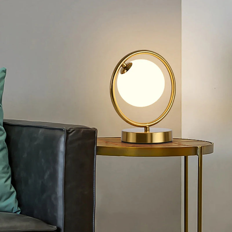 Afralia™ Modern LED Table Lamp - Nordic Creative Brass Glass Desk Light for Dining and Living Room