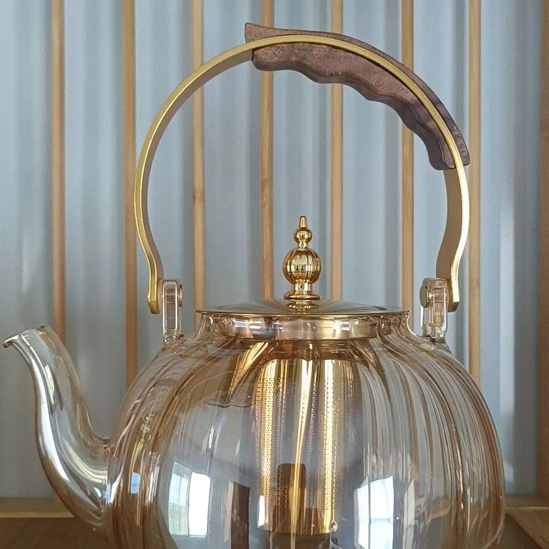 Afralia™ Amber Glass Teapot Filter, Heat-Resistant, Pumpkin-Shaped, Ideal for Boiling and Brewing Tea