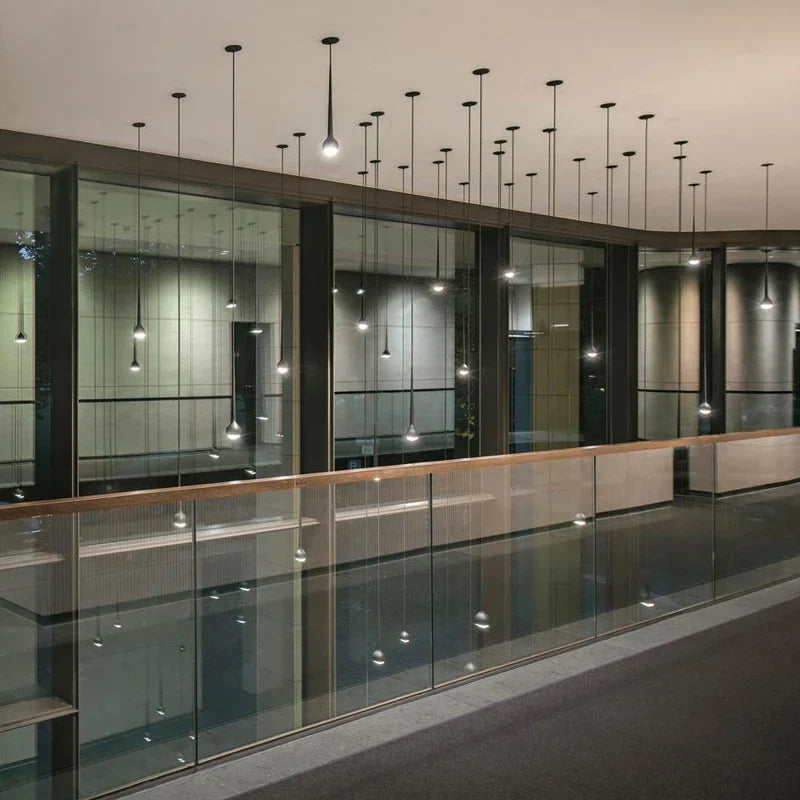 Afralia™ Water Drop Pendant Light: Modern Luxury Chandelier for Staircase, Bedside, Bar, and Restaurant