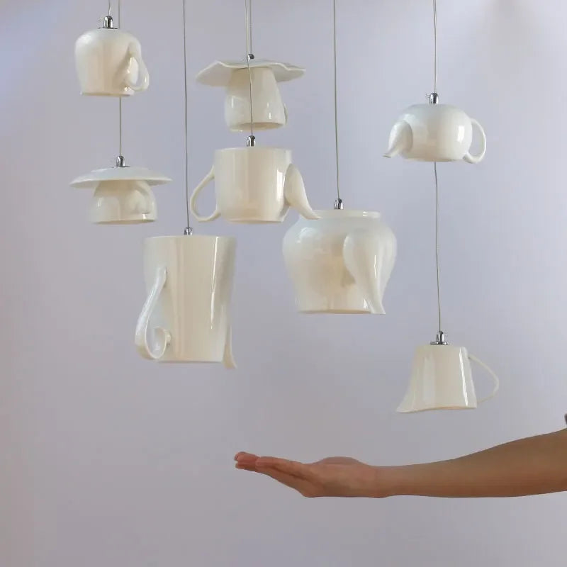 Afralia™ Ceramic LED Pendant Lights: Nordic Teapot Design for Modern Living and Kitchen.