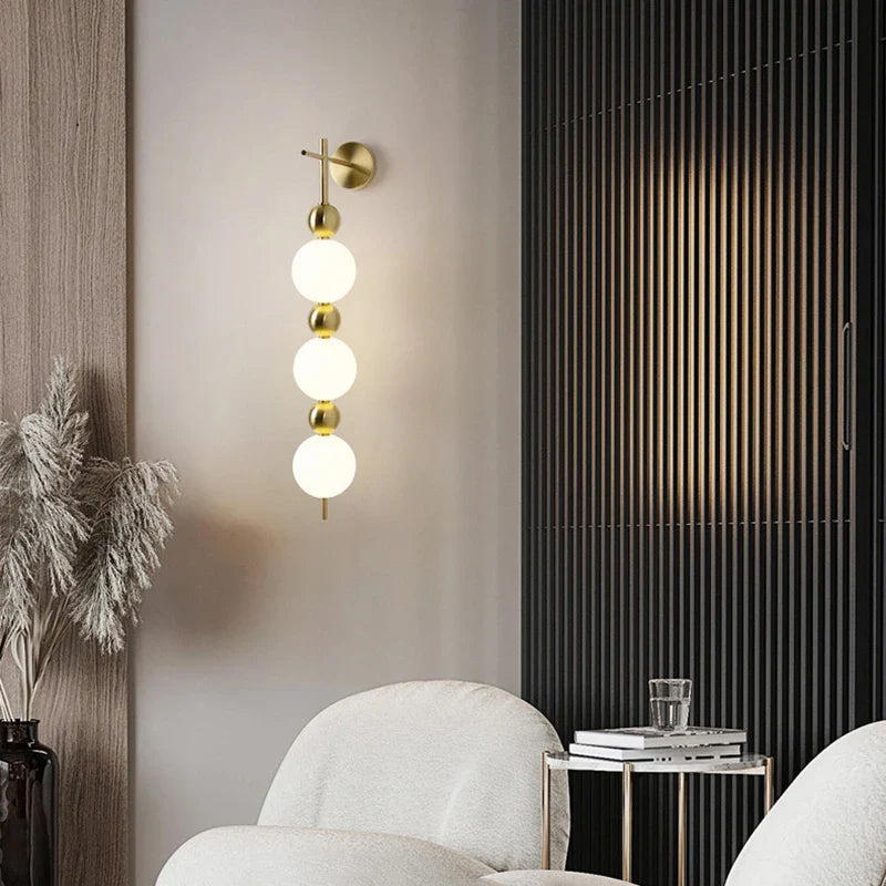 Afralia™ LED Wall Sconce White Acrylic Ball Gold Metal Bedroom Lighting