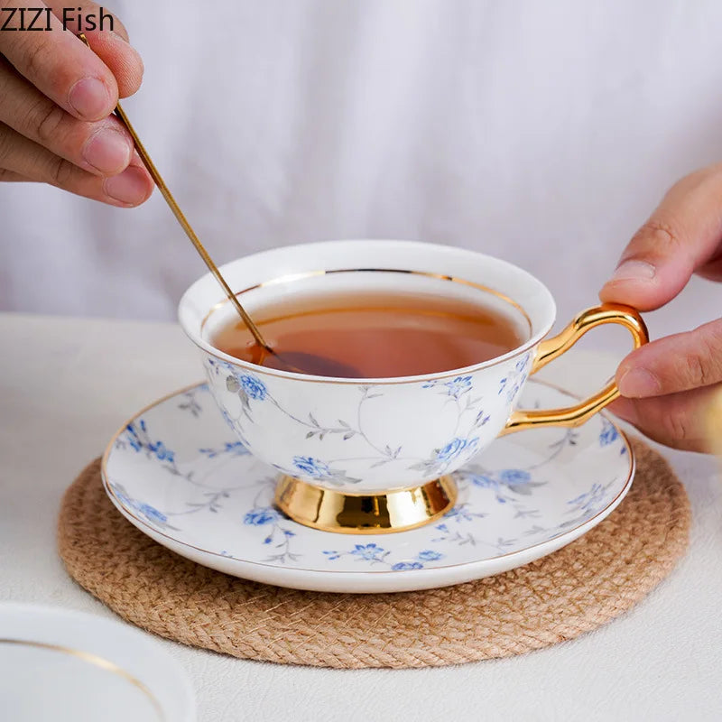 Afralia™ Gold Flowers Pattern Ceramic Cup & Saucer Set for Elegant Dining Experience
